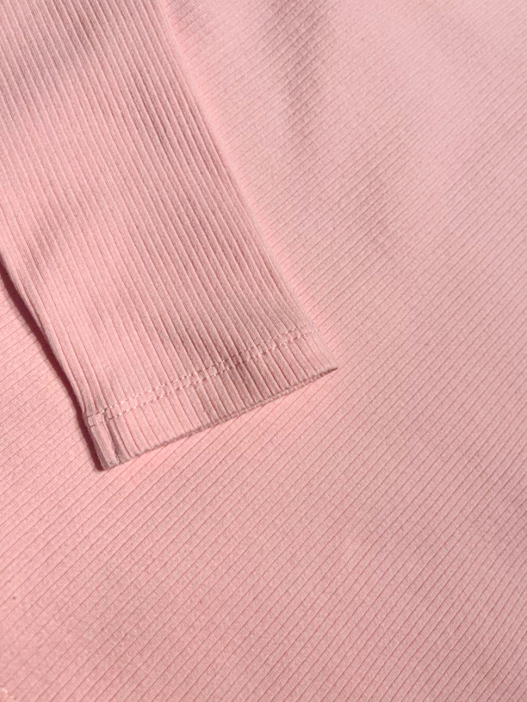 Close-up of premium 290g heavyweight cotton fabric on Ogender pink tee, showing the soft and durable ribbed texture.
