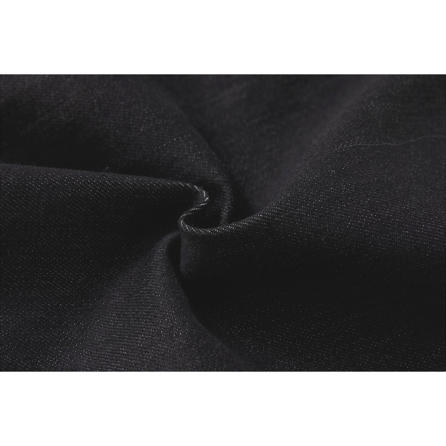 Texture shot of the soft Modal-cotton blend denim fabric, showcasing the premium weave.