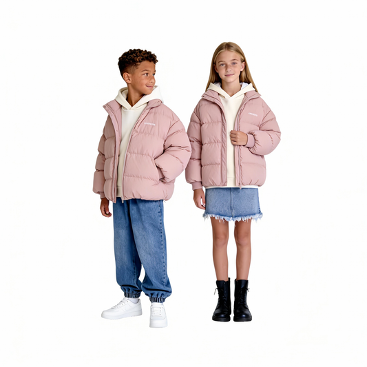 Unisex kids wearing Ogender pink puffer jackets, gender-neutral winter streetwear for teens.