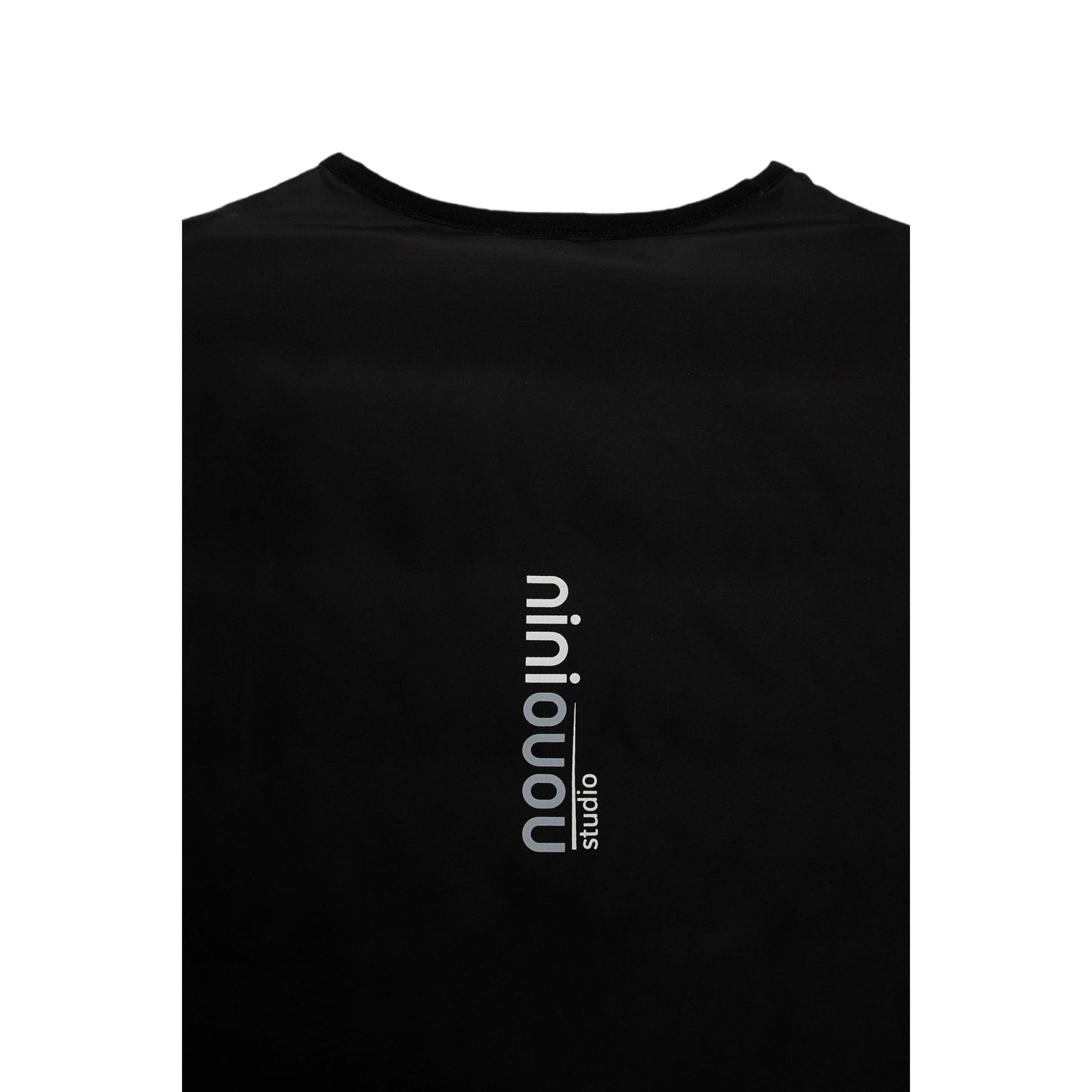 Detailed shot of the signature vertical branding printed on the back of the jacket.