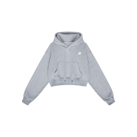 ØGENDER heather grey cropped fleece hoodie with "Ø" minimalist branding, featuring a relaxed boxy fit and 42% cotton blend.