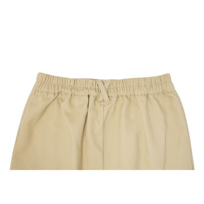 Detailed shot of the comfortable elastic waistband and durable stitching on the khaki cotton skirt.