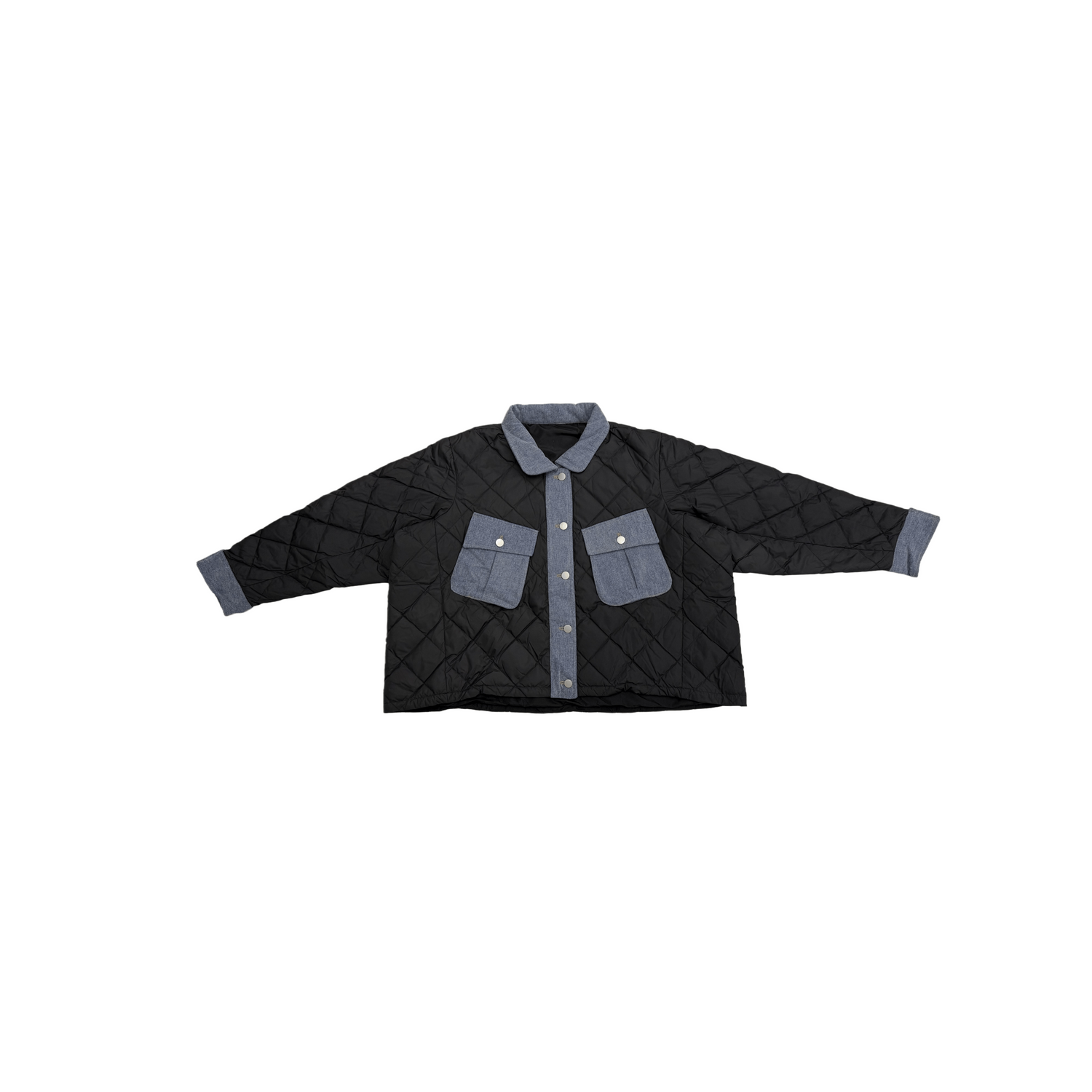 Front view of the ninø oversized denim puffer jacket featuring diamond quilting and contrast denim pockets.