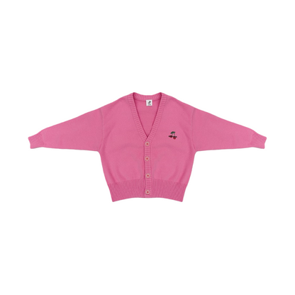 Front view of the ninø kids' soft pink knit cardigan, featuring a V-neckline and a small cherry embroidery on the chest.