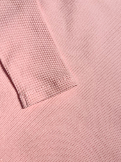 Close-up of premium 290g heavyweight cotton fabric on Ogender pink tee, showing the soft and durable ribbed texture.