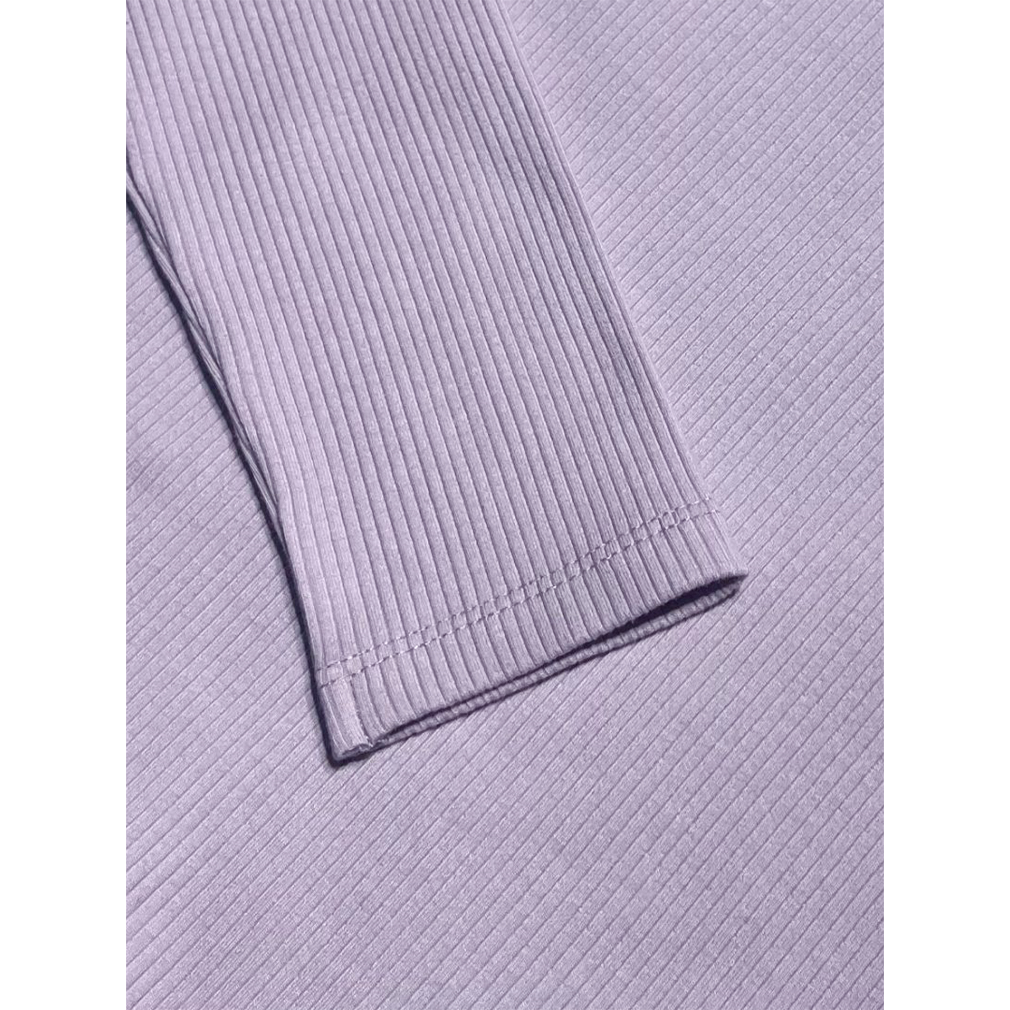 Close-up of 290g purple ribbed cotton fabric texture, 93% cotton and 7% elastane blend.
