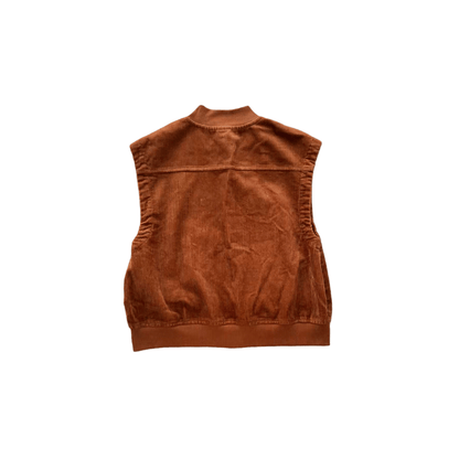 Back view of the corduroy vest highlighting the clean tailoring and rich caramel texture.
