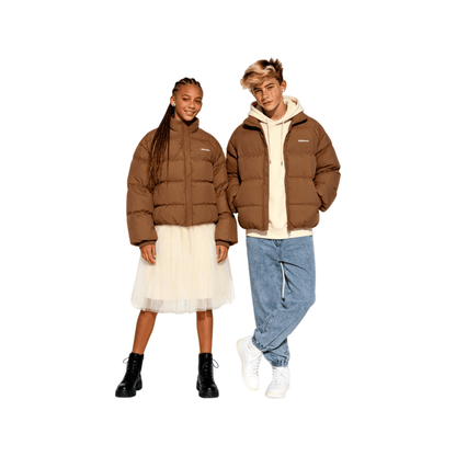 Model wearing OGENDER oversized genderless puffer jacket, Korean streetwear style for adults and teens.