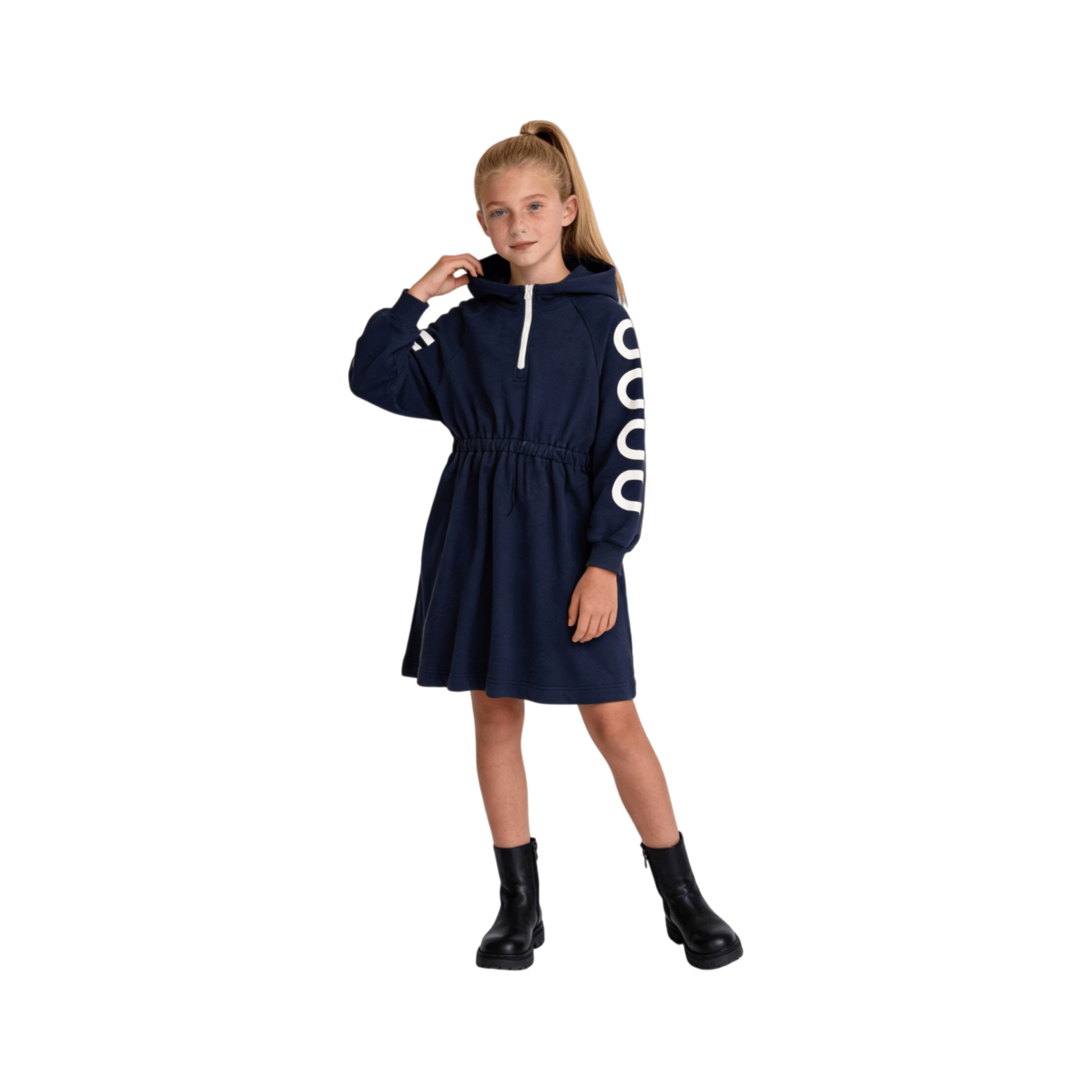 A young girl wearing the navy sweatshirt dress, showcasing the elastic waistband and comfortable everyday fit.