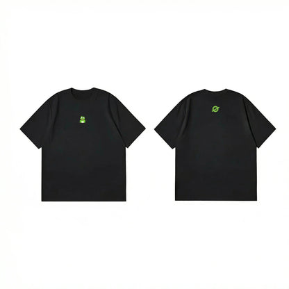 ØGENDER minimalist black graphic tee with a green cartoon frog, aesthetic unisex streetwear for teens.