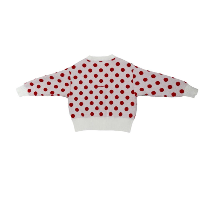 Back view of the polka dot cardigan showcasing the "nininono" brand embroidery across the shoulders.