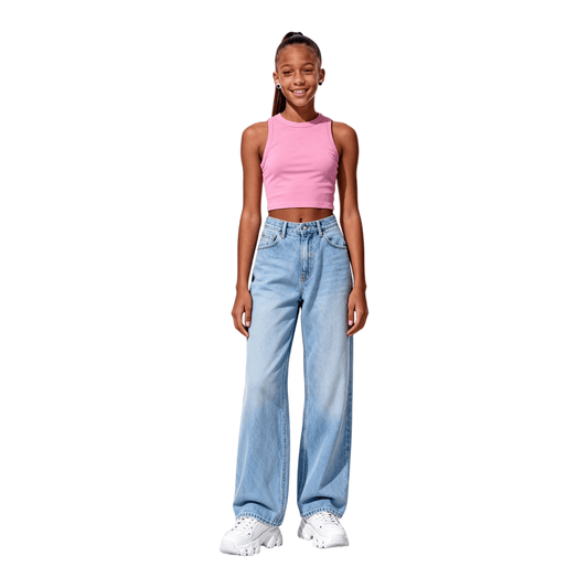 Teenage model wearing pink cropped tank top with wide-leg jeans, chic urban streetwear style.