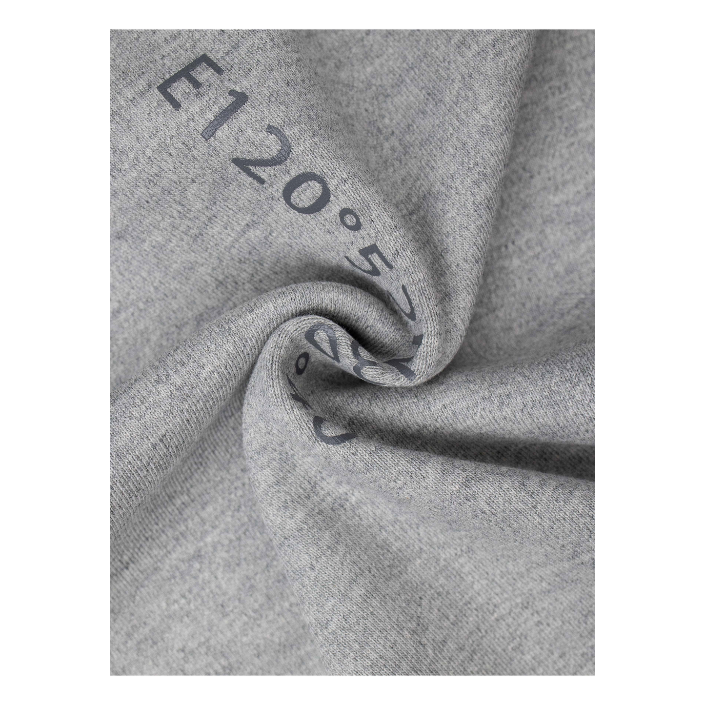 Extreme close-up of the 340g/m2 cotton fabric, highlighting the premium knit texture and the durable 95.5% cotton blend.