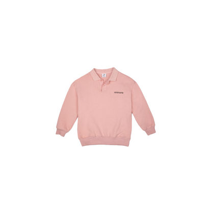 Front view of the pink preppy polo sweatshirt for kids featuring a classic collar and button placket.