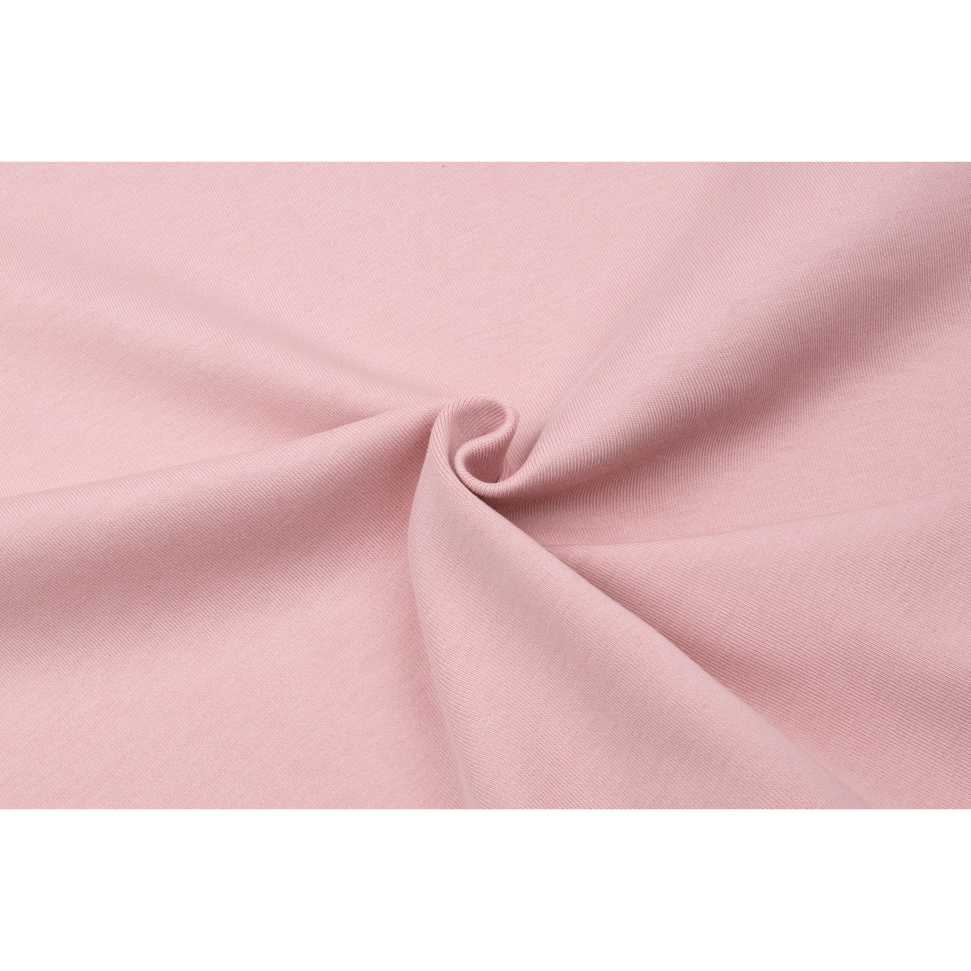 Close-up of the 340g/m² cotton fabric showing the premium knit texture and moisture-wicking structure.