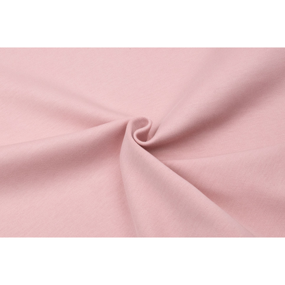 Close-up of the 340g/m² cotton fabric showing the premium knit texture and moisture-wicking structure.