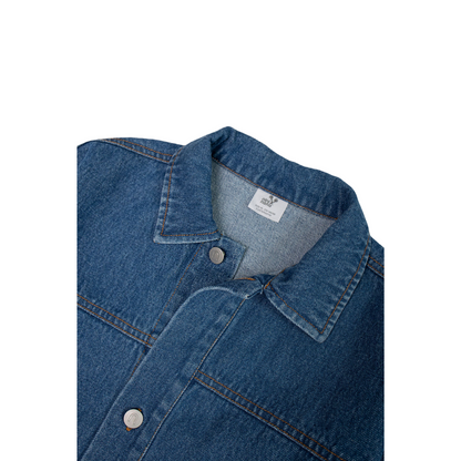 Close-up of the classic collar and internal brand label on the washed cotton denim jacket.