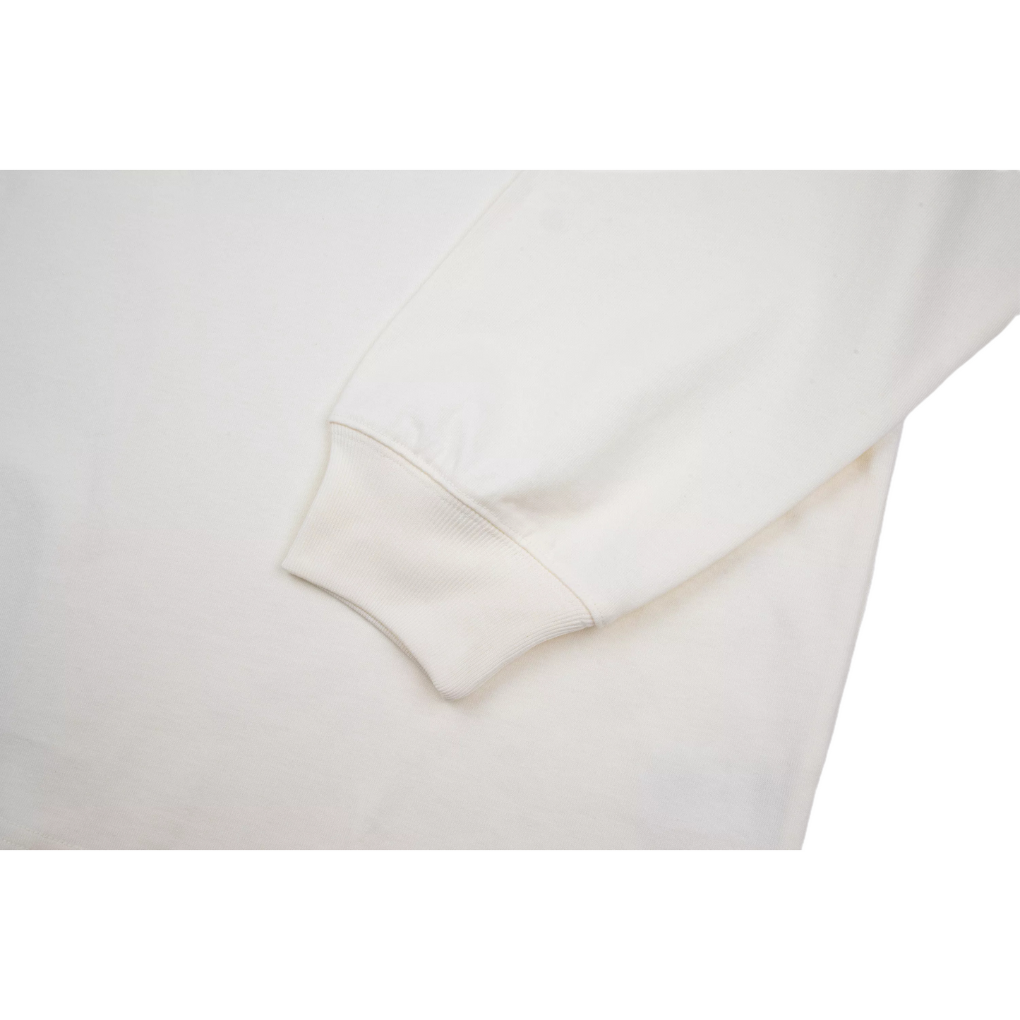 Close-up of the ribbed cuff, highlighting the clean construction and comfortable elasticated fit.