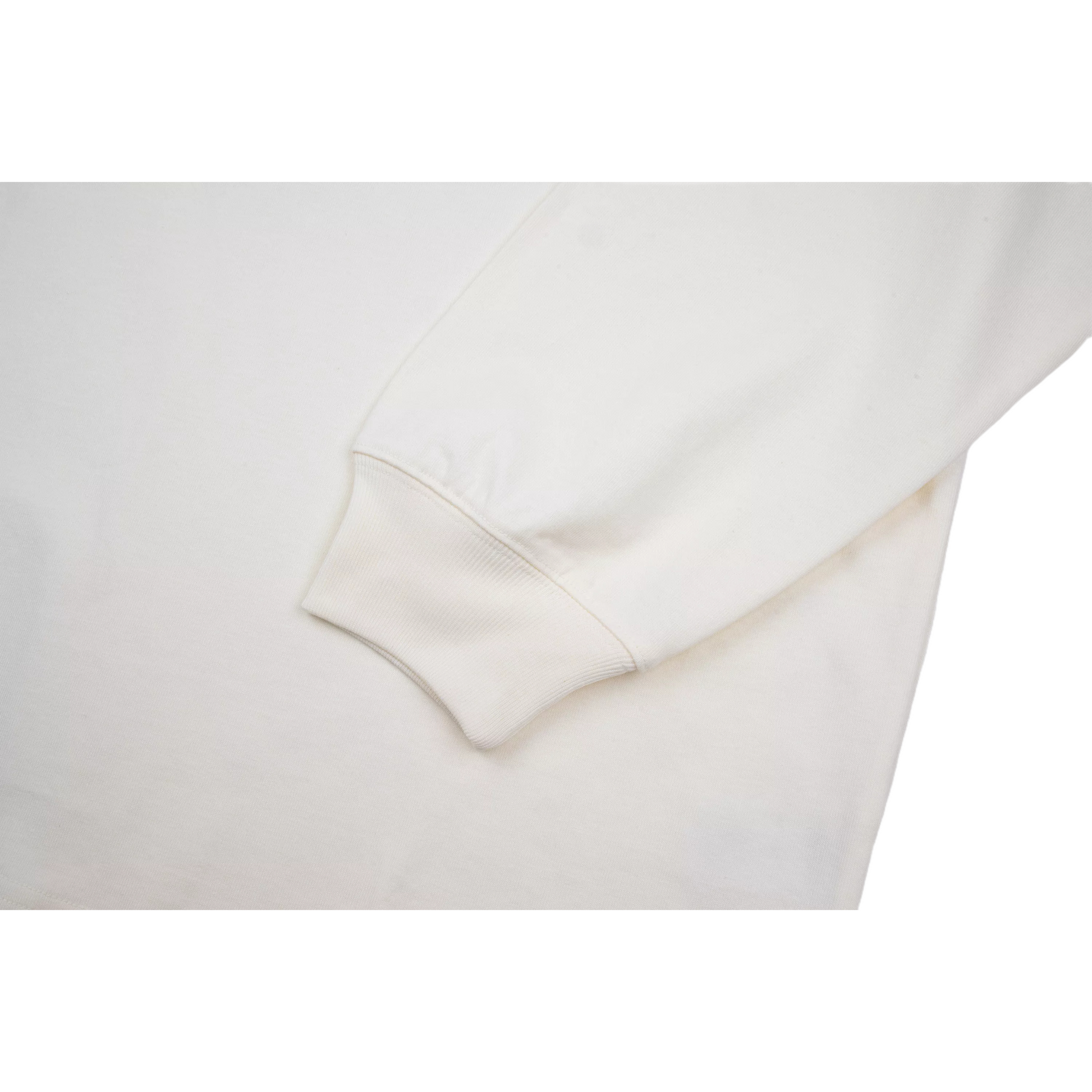 Close-up of the ribbed cuff, highlighting the clean construction and comfortable elasticated fit.