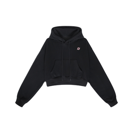 Front view of ØGENDER black cropped oversized hoodie, featuring the signature "Ø" logo on the chest, premium fleece-lined streetwear.