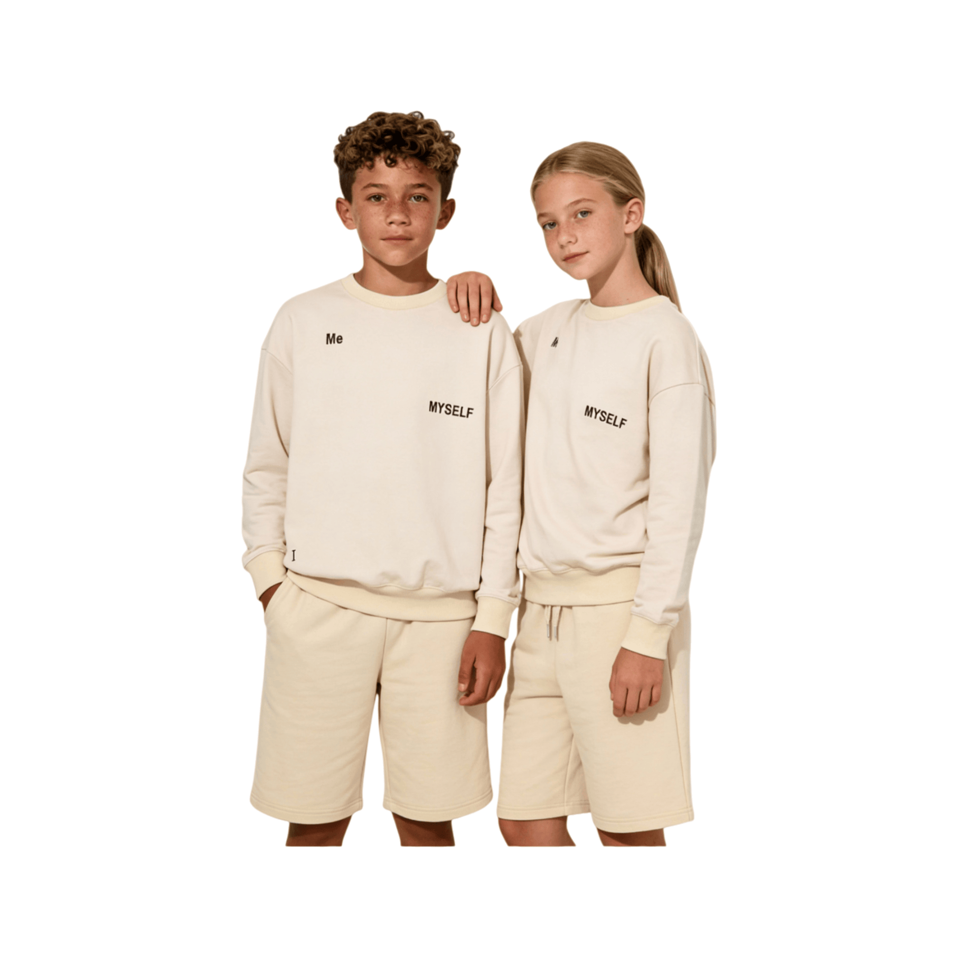 Kids wearing the signature DNA sweatshirts in khaki and pink, showcasing the relaxed gender-neutral fit.