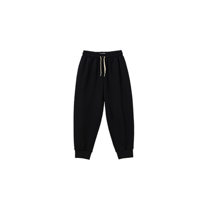 Front flat lay of kids' 100% cotton jogger pants in Jet Black, featuring a comfortable elastic waistband and relaxed fit.