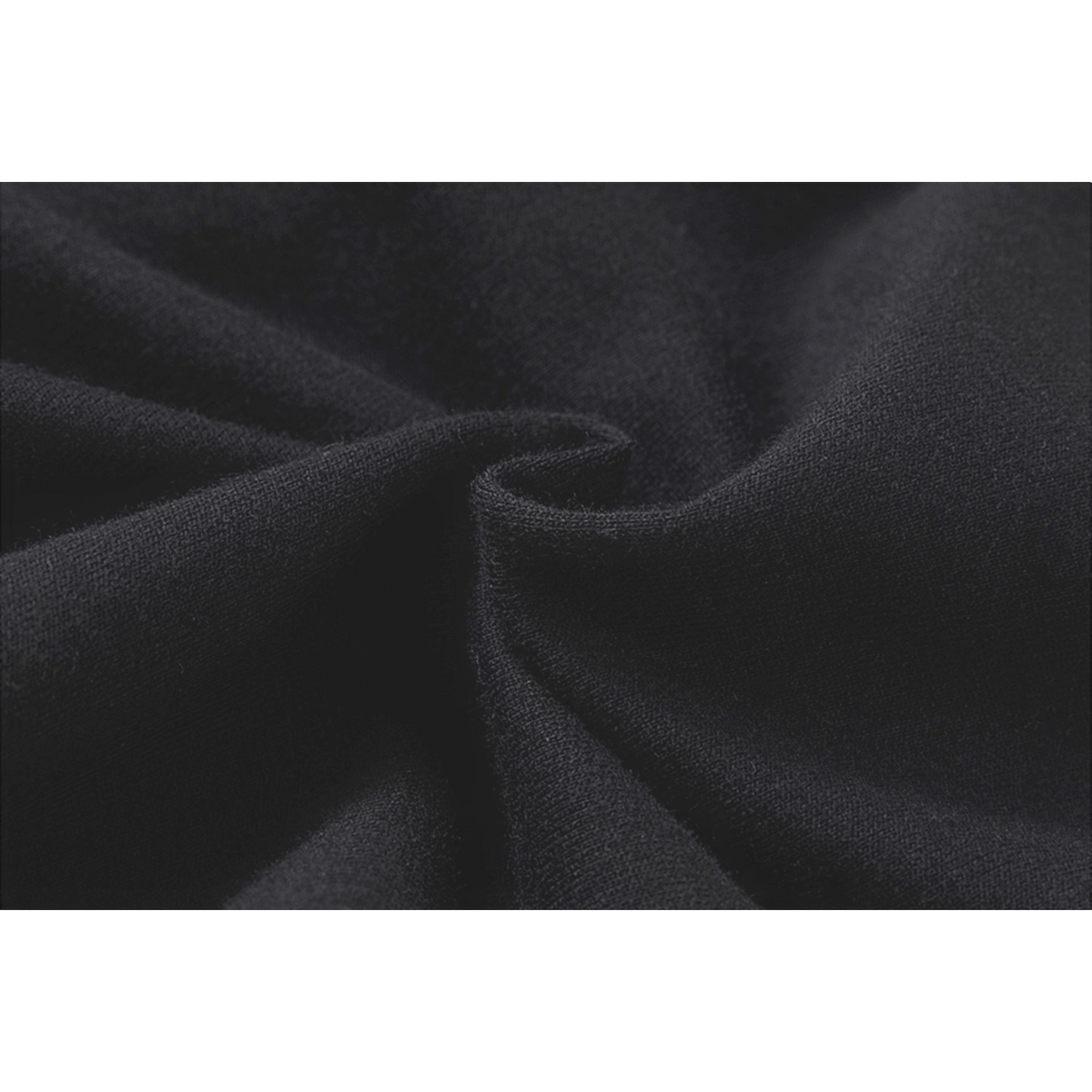 Extreme close-up of the 100% premium cotton fabric in jet black, highlighting the soft, high-density French terry knit and breathable texture.