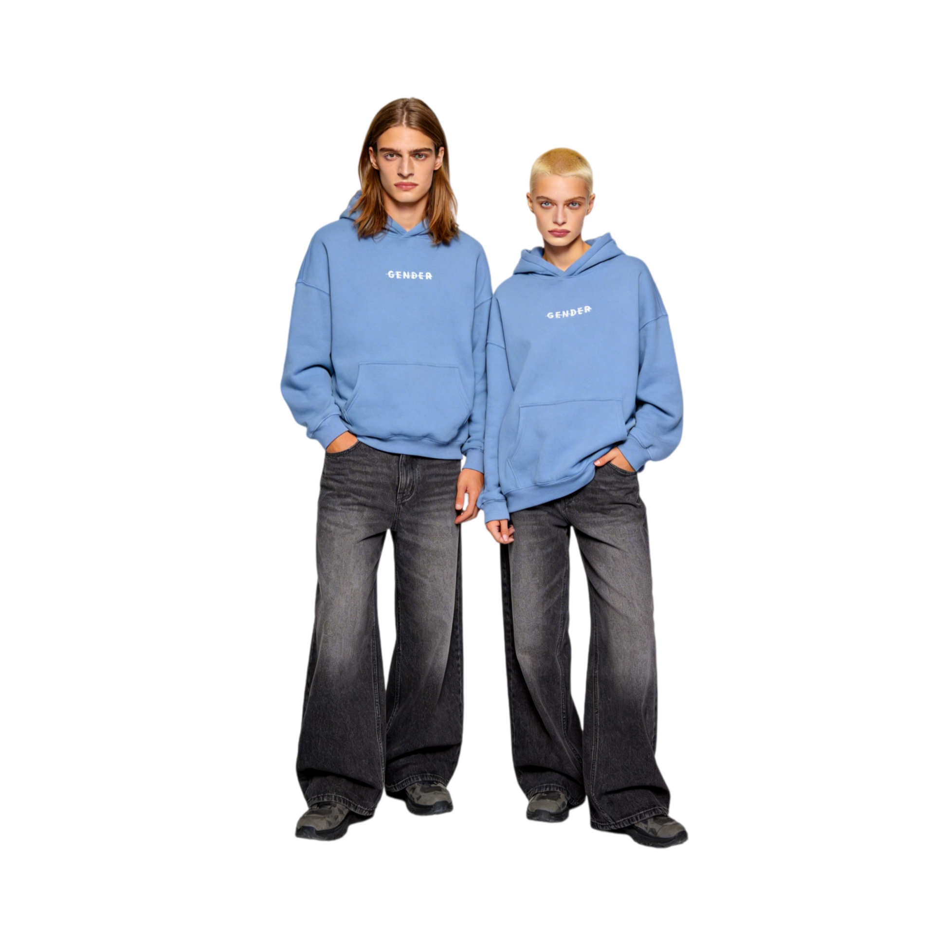 Male and female models wearing ØGENDER medium blue oversized fleece hoodies featuring "Gender" text print, showcasing the inclusive unisex fit.