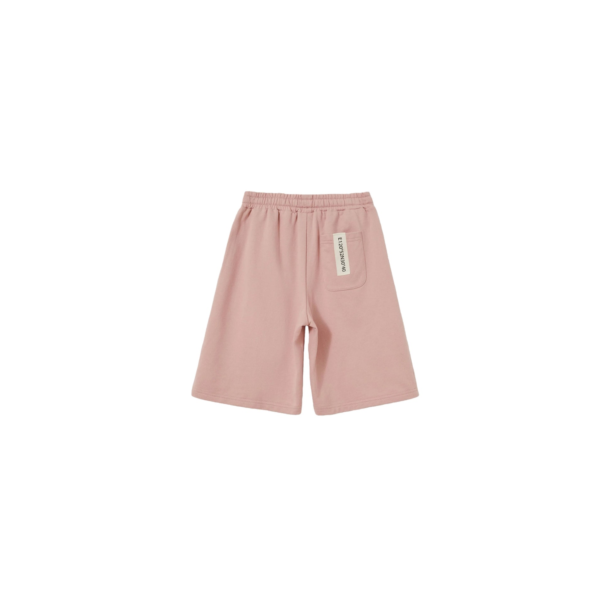 Back view of Pink kids sweat shorts featuring the industrial woven label.