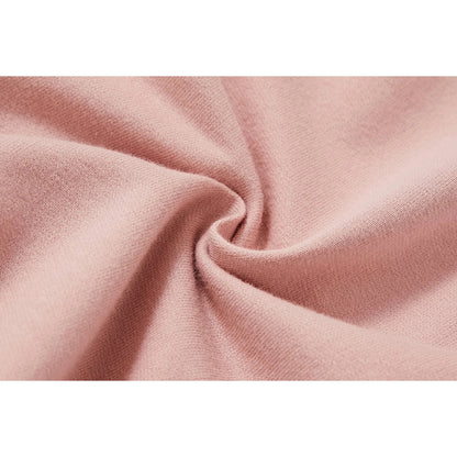 Macro shot of the 230 GSM breathable French terry fabric texture in Pink.