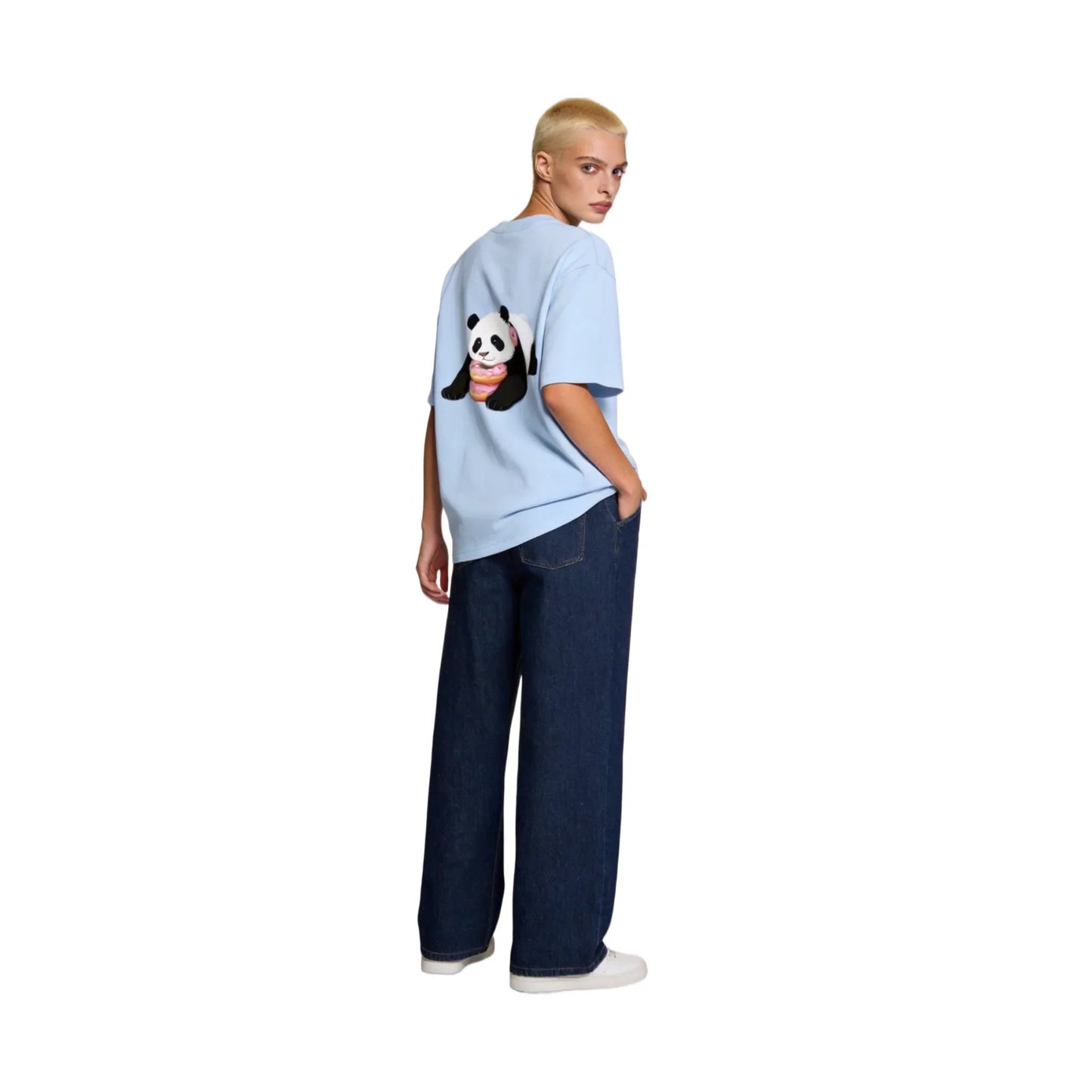 Full-body side profile of a buzz-cut female model wearing the Ogender ice blue 240 GSM tee. Showcases the 'Donut Panda' original IP graphic on the back, paired with dark blue jeans.