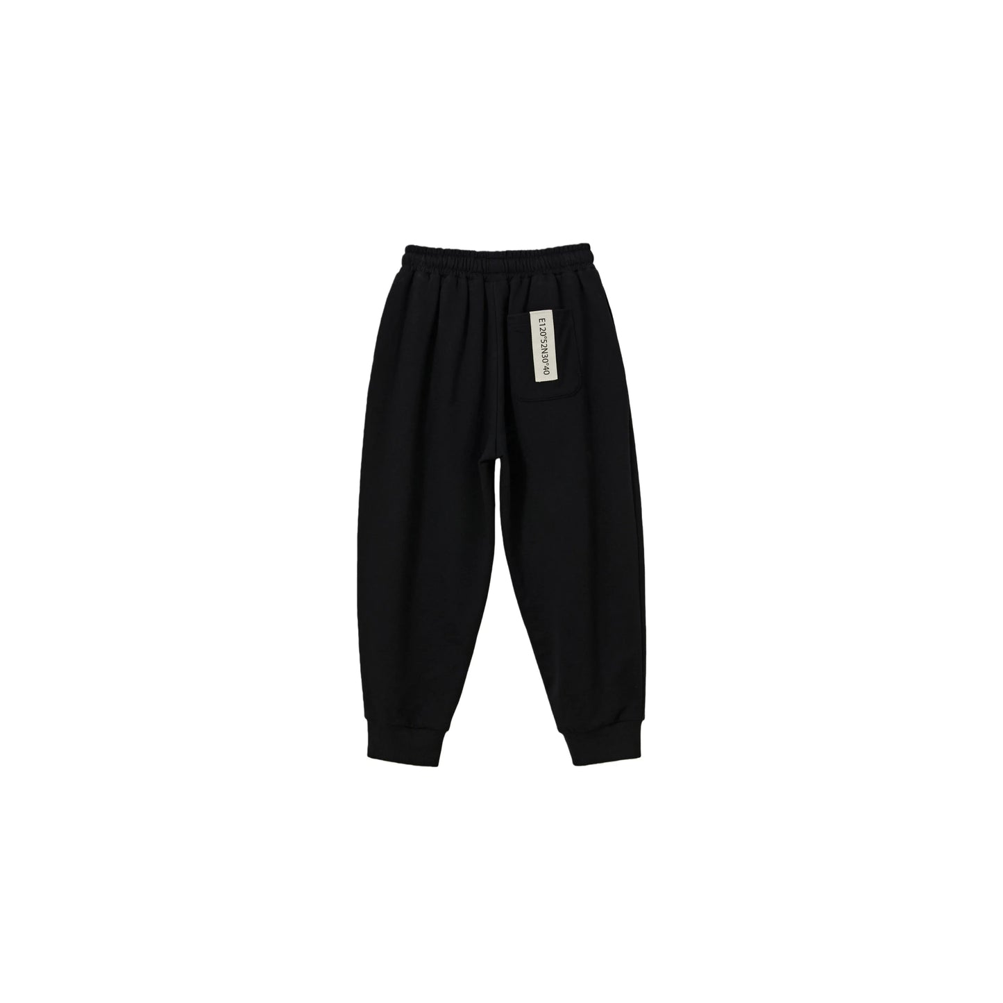 Back view of black kids sweatpants with signature industrial woven label.