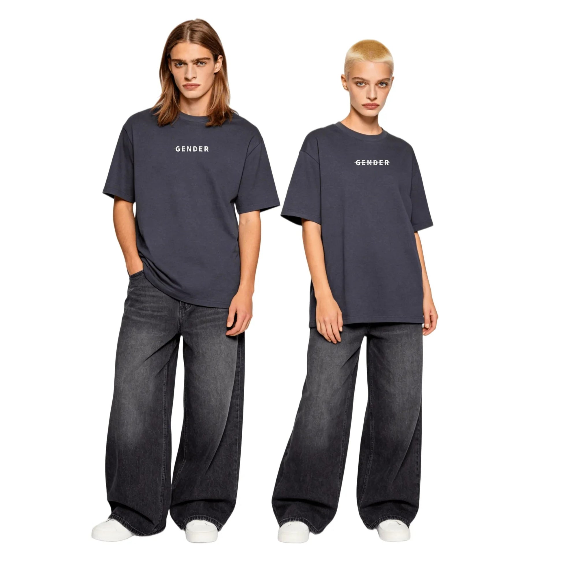 Young male and female models in matching Ogender dark gray oversized tees and wide-leg denim jeans, showcasing a coordinated unisex streetwear look.