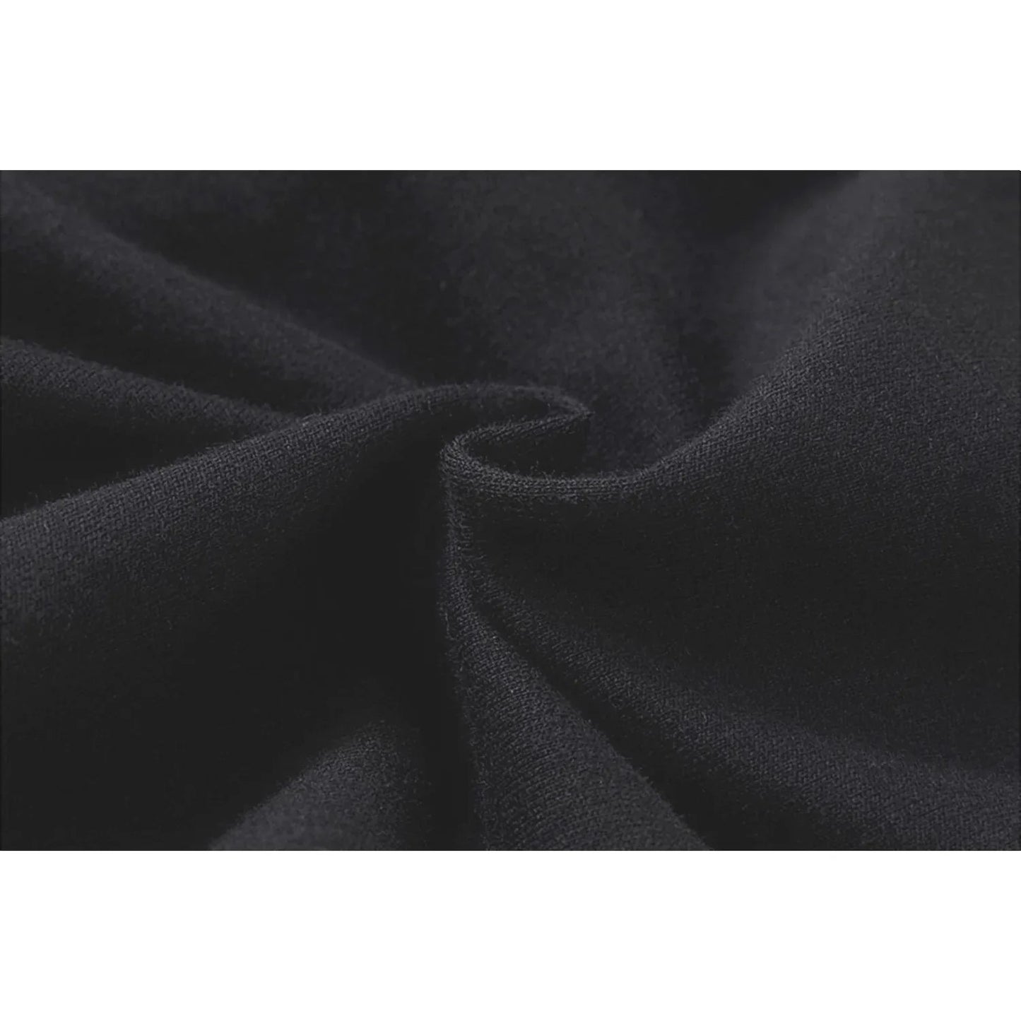 Macro shot of the 240 GSM breathable French terry cotton fabric texture.