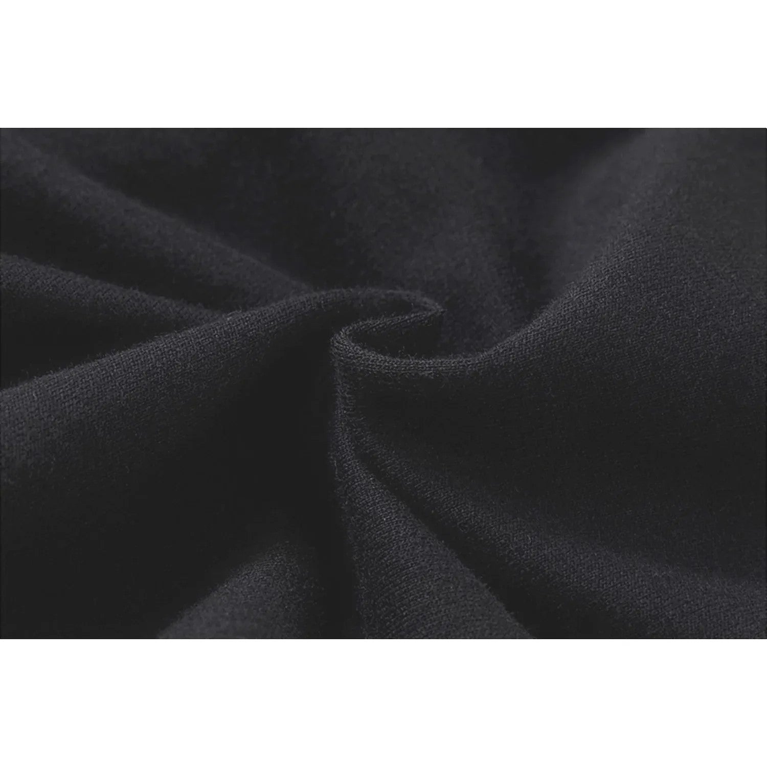 Macro shot of the 240 GSM breathable French terry cotton fabric texture.