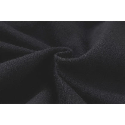 Macro shot of the 240 GSM breathable French terry cotton fabric texture.