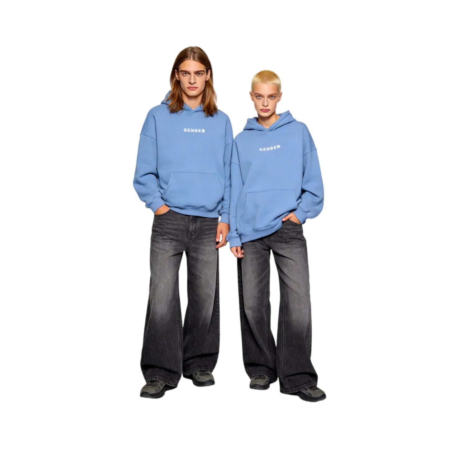 Lifestyle shot of a model wearing the Ogender wash blue 350 GSM fleece-lined hoodie. Showcases the oversized silhouette, dropped shoulders, and the strike-through Gender logo on the chest