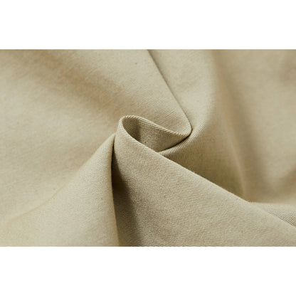 Detailed texture shot of the 98% breathable cotton stretch fabric in sage green.