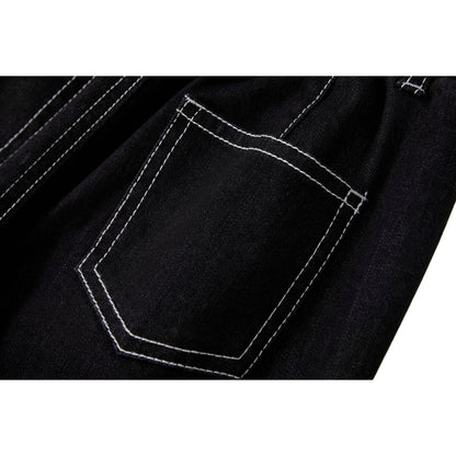 Close-up of the signature rear patch pocket on Ogender modal-blend denim.