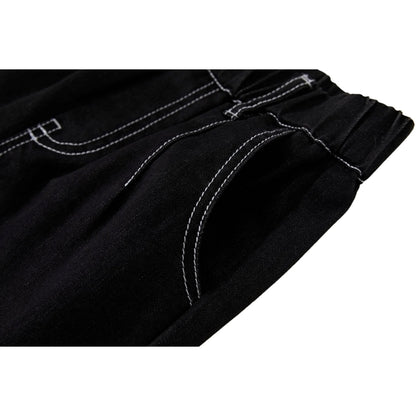 Detailed shot of the functional front slant pocket with modern white stitch detailing.