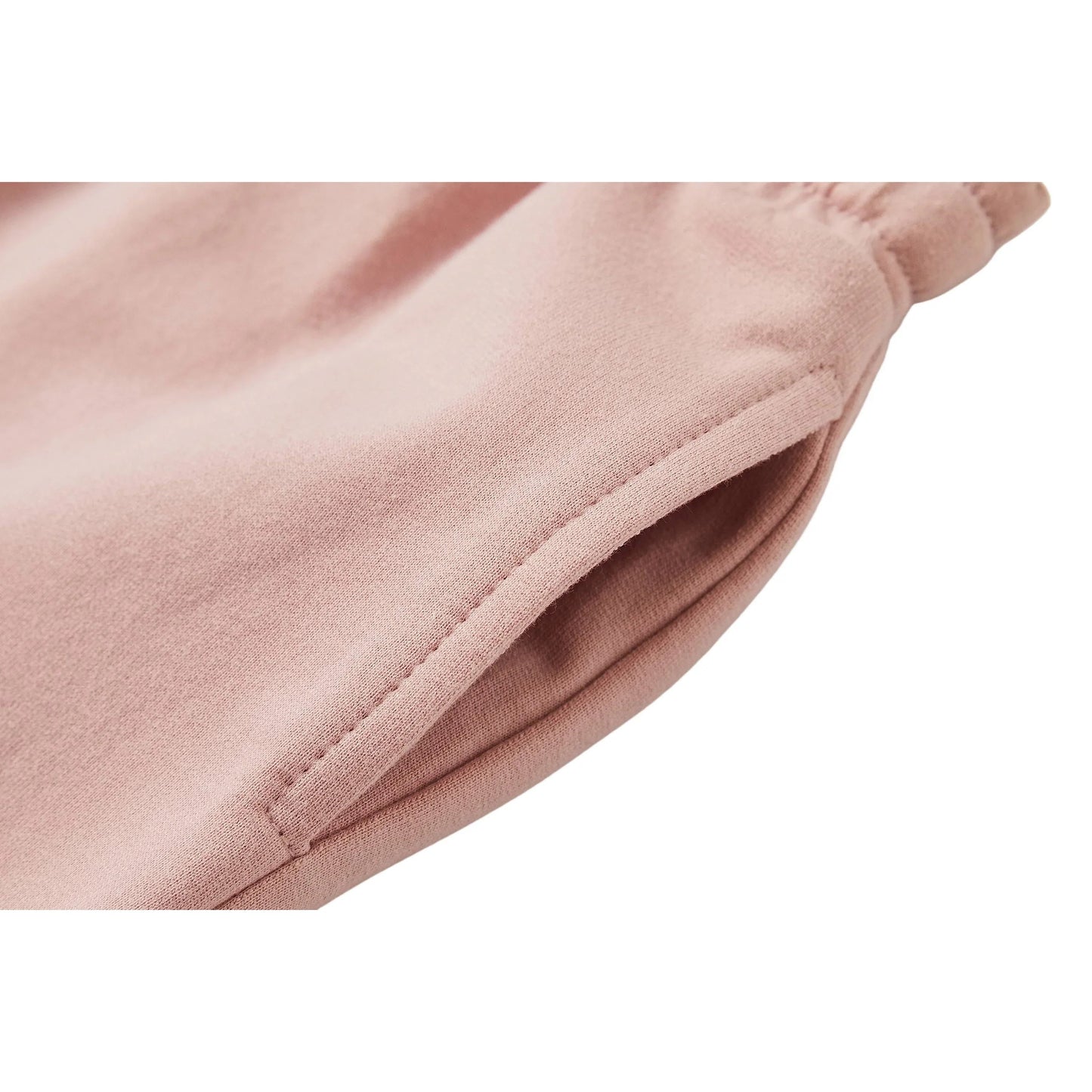 Detail view of the practical deep side pockets on Ogender kids sweat shorts.