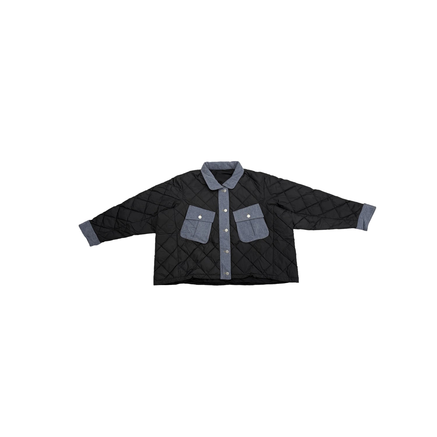 Front view flat lay of the oversized black diamond-quilted puffer jacket with denim pockets.