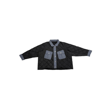 Front view flat lay of the oversized black diamond-quilted puffer jacket with denim pockets.