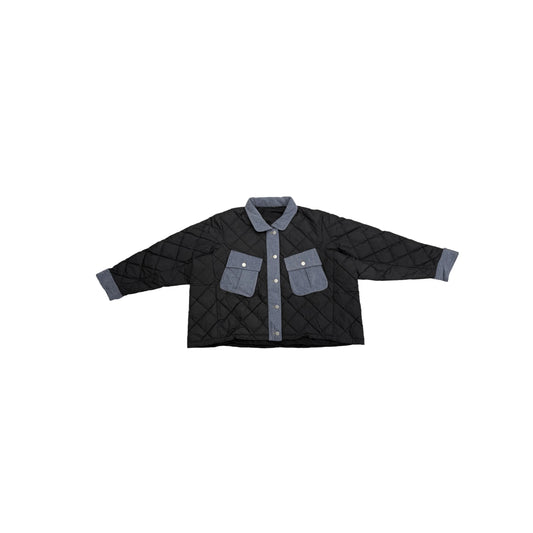 Front view flat lay of the oversized black diamond-quilted puffer jacket with denim pockets.
