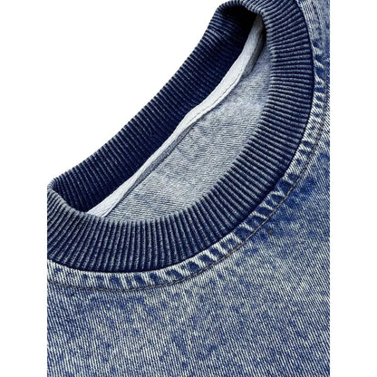 Close-up of the ribbed crew neckline and the authentic washed denim texture.