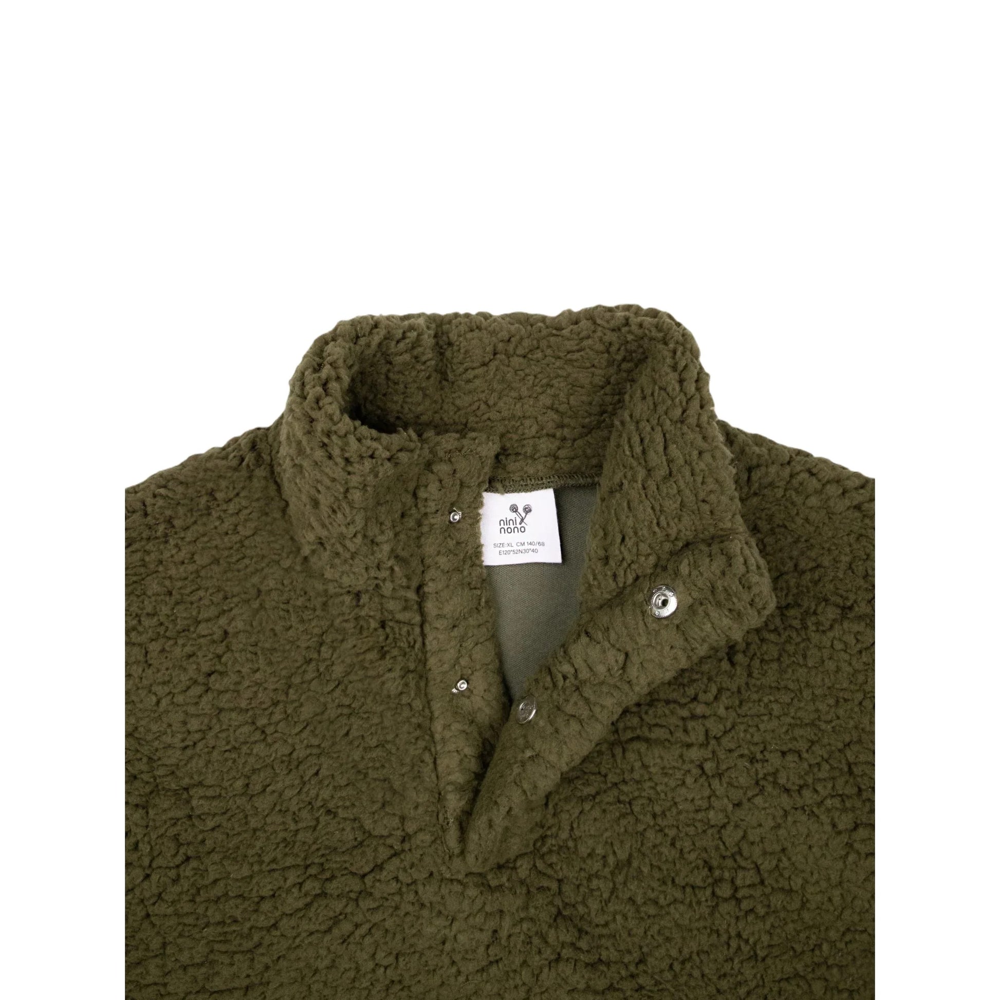 Close-up of the high-neck collar and hidden snap placket on the Sherpa fleece.