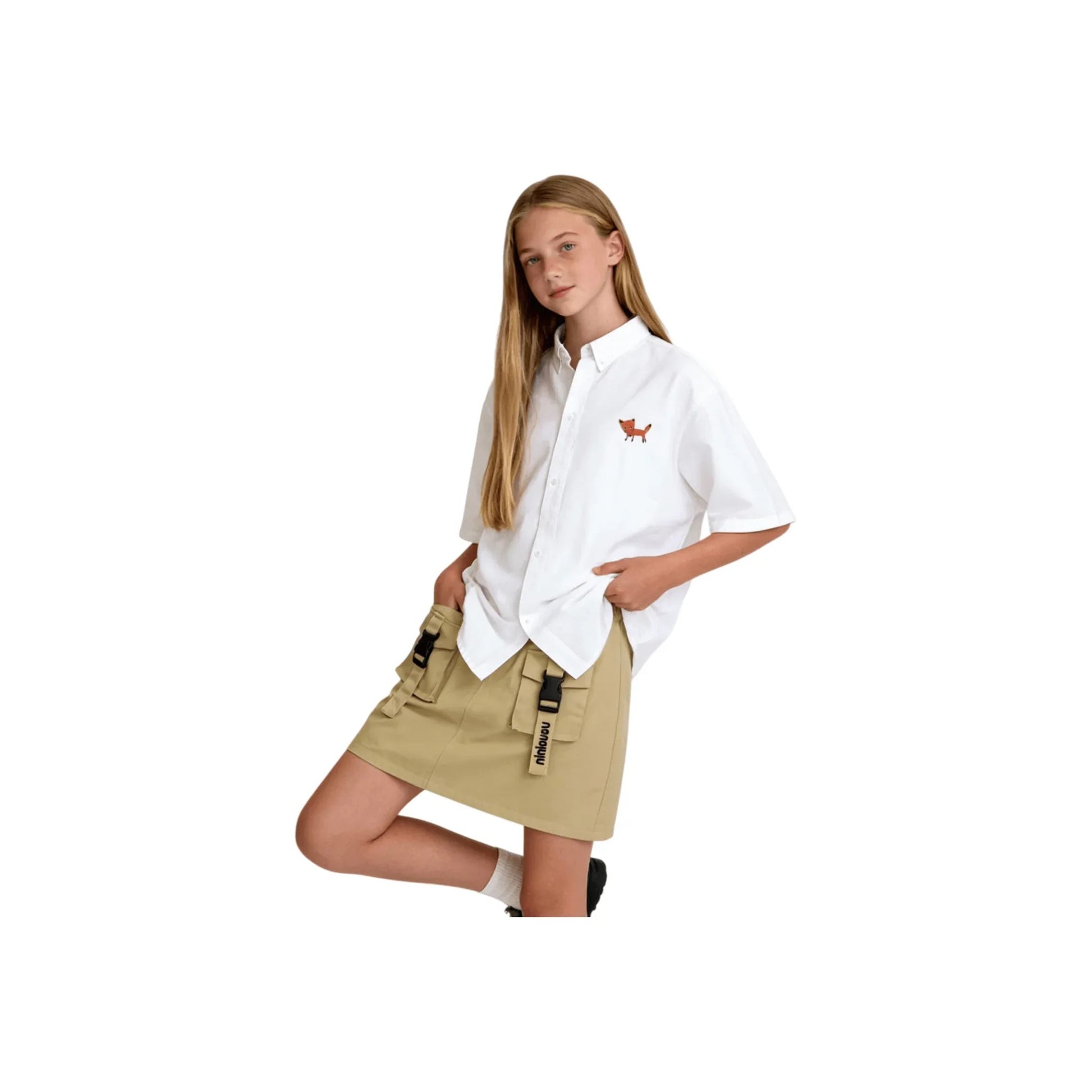A girl posing in the utility cargo skirt, showcasing the functional side-pocket detail