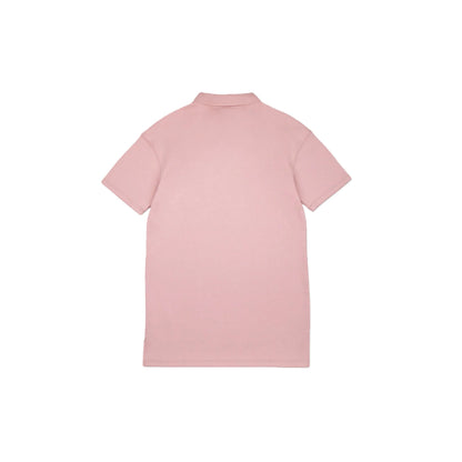 Full back view of the pink polo dress showing the clean, structured silhouette.