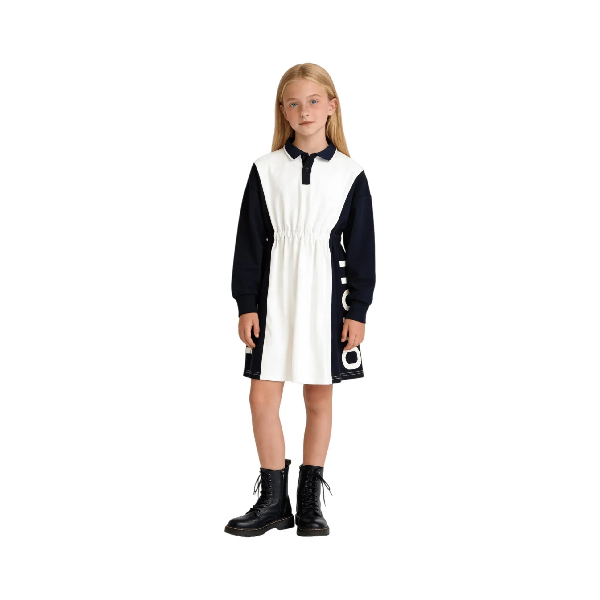 A young girl modeling the navy and white color-block polo dress, front view.
