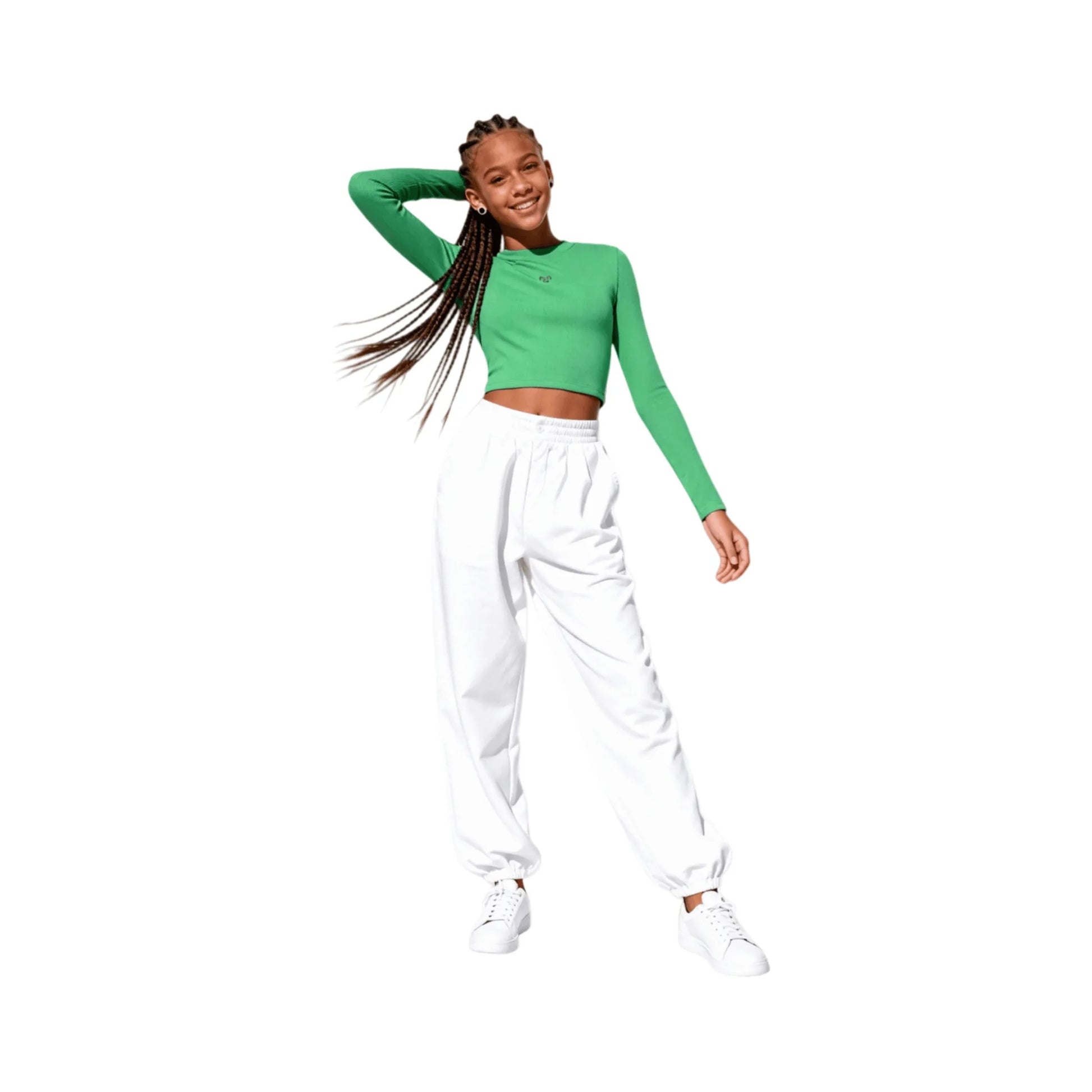 Full-body shot of a girl model styling the Ogender green cropped tee with white baggy sweatpants and sneakers.